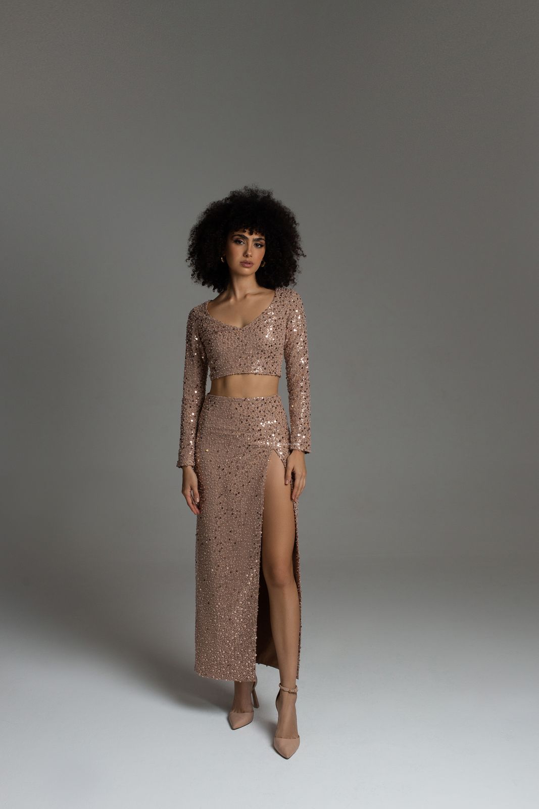 Sequins skirt with a side slit